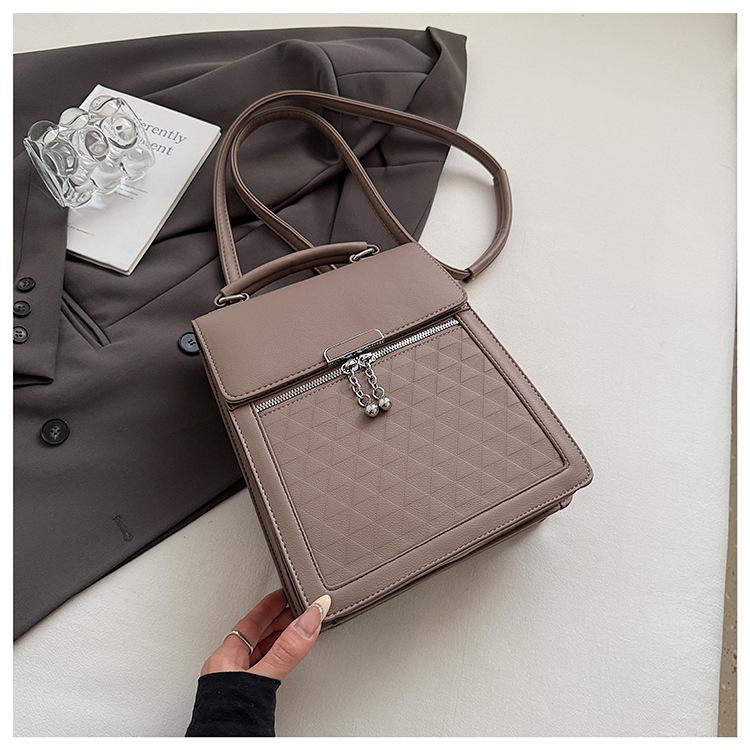 2025 Summer New Fashionable Versatile Simple Shoulder Crossbody Hong Kong Style Retro High-end Texture Commuter Backpack