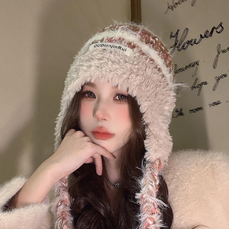 A Japanese style Winter Country Style Plush Double Braid Color Blocked Cold proof and Warm Ear Protecting Hat That Shows Off The Face