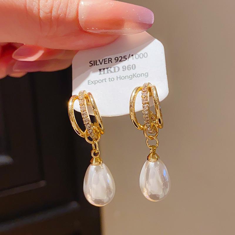 Gold-Plated Silver Bow Pearl Earrings: Retro, Elegant, and Luxurious Studs