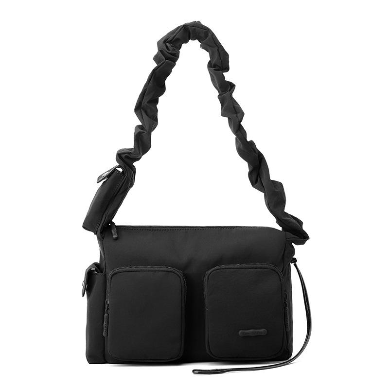 Neuer Design-Sinn einfache Damen-Tasche plissiert lässig vielseitig Nische Schulter Achseltasche
