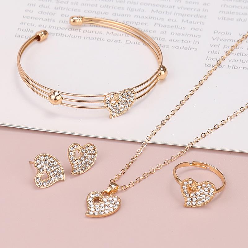 Elegant Heart & Butterfly Jewelry Set for Women: Stylish European & American Design with Stud Earrings, Ring, Bracelet, and Necklace.