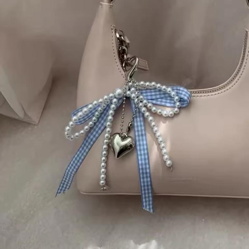 Women Fashionable Bow Keychain Shaped Pearl Mobile Phone Charm, Bag Charm And Accessory.