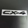Mazda CX-30, CX-4, and CX-5 Glossy Black Badges: Numerical, Trunk Letter, and Tail Displacement Badges.