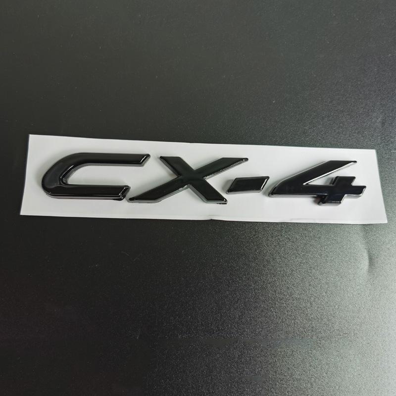 Mazda CX-30, CX-4, and CX-5 Glossy Black Badges: Numerical, Trunk Letter, and Tail Displacement Badges.