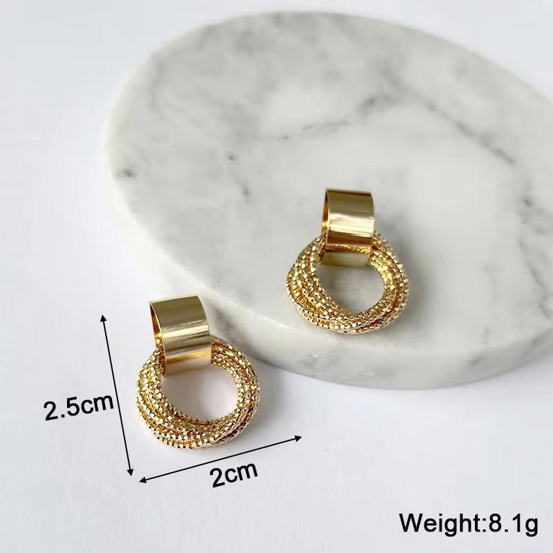 New Exaggerated Twist Metal Dangle Earrings for Women Gold Color Punk Fashion Female Hanging Earrings Boho Geometry Ear Zircon