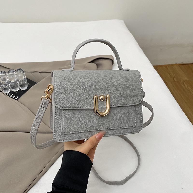 

2025 осенняя мода новая сумочка женская высокоценная маленькая квадратная сумка для поездок на работу корейская версия модная простая сумка через плечо женская серый