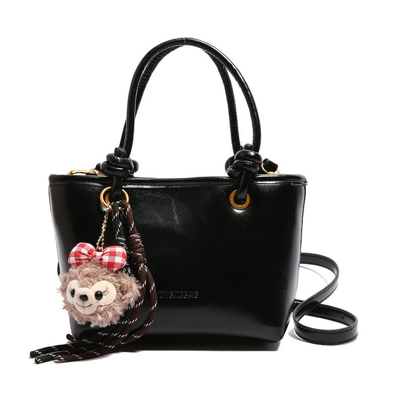 Oil wax leather retro texture shoulder bag fashionable commuter bucket bag niche messenger bag no pendant