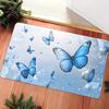 1pc Blue butterfly patterned floor mat, machine washable polyester, suitable for bedroom and living room décor.