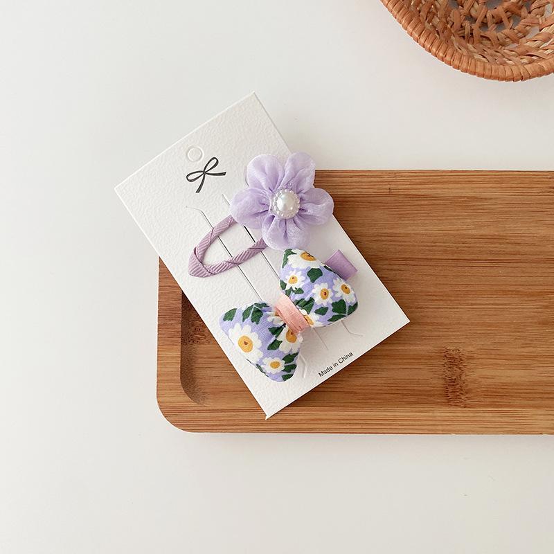 2 Purple Bowknot Hair Clips, Perfect for Korean-style Young Girls, Versatile for Youthful Bangs and Hair Accessories.