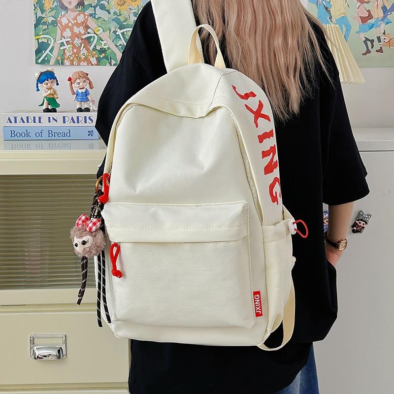 Schoolbag Japanese schoolbag female college student ins large capacity, simple solid color alphabet backpack male junior high school backpack