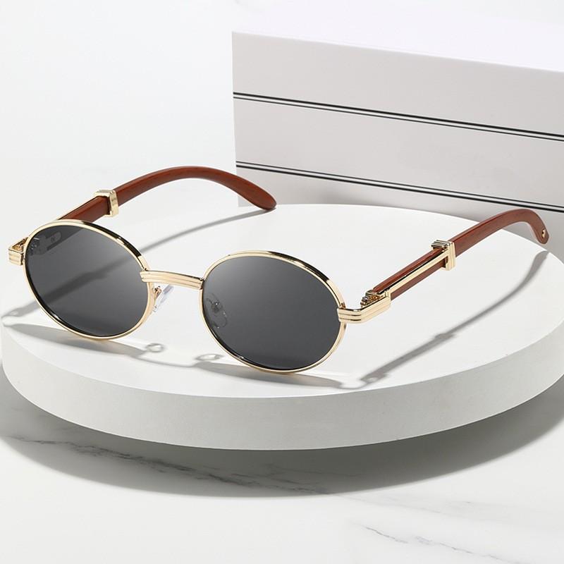 Fashion European and American sunglasses new women's oval frame metal glasses advanced sense Internet celebrity sunshades