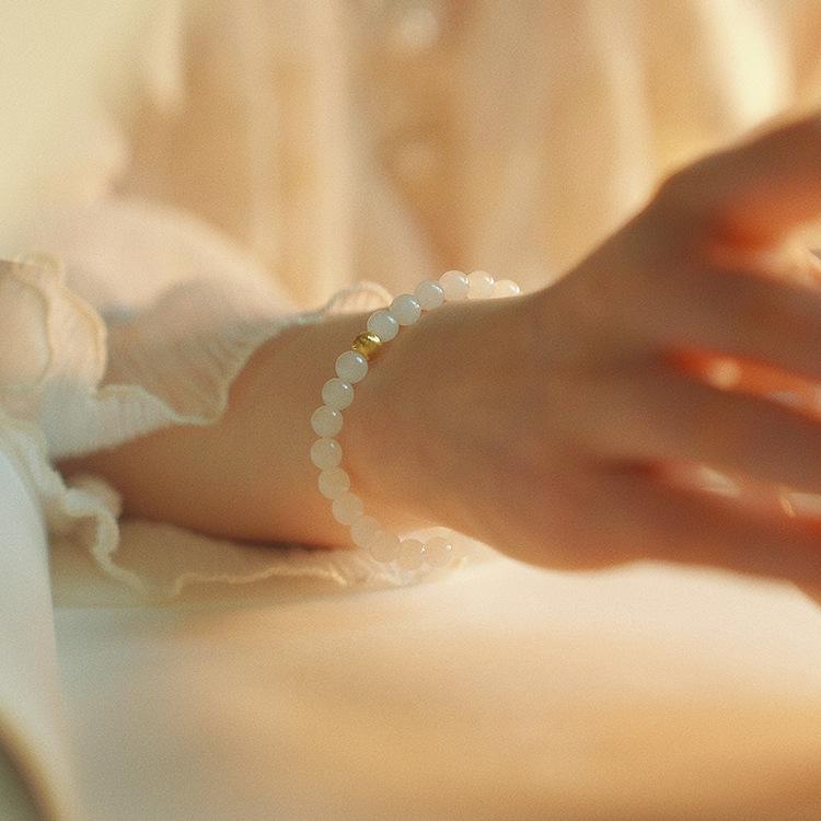 Hetian white jade bracelet for women, niche design, round bead jewelry, new light luxury high-end feel bracelet
