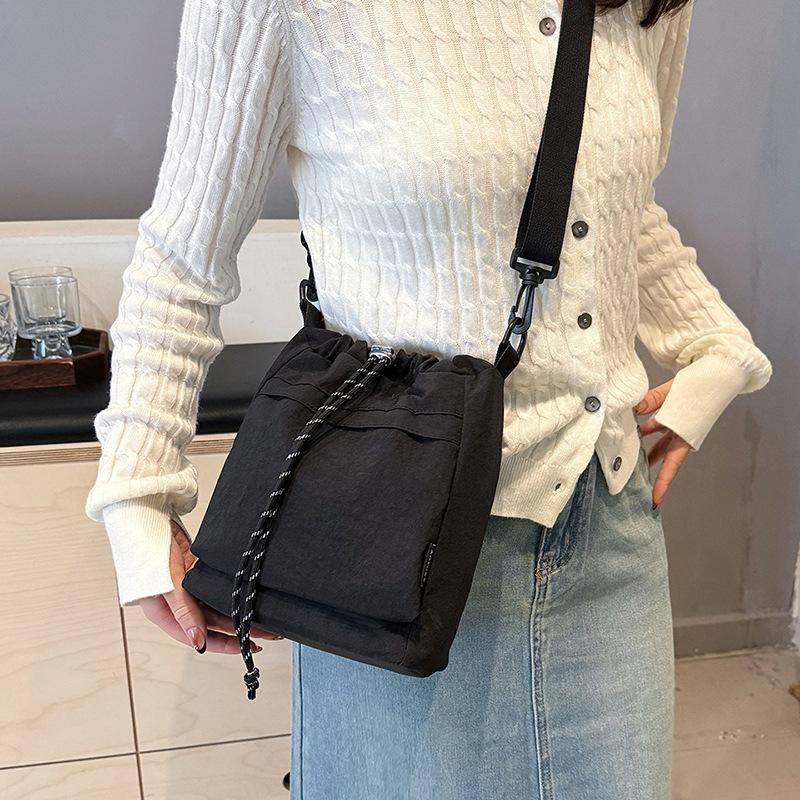 Simple fashiable versatile lightweight backpack sports nyl cloth bag, commuting shoulder bag, drawstring handbag, travel bag