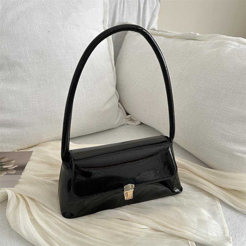 

Ретро нишевая сумка-багет женская сумка 2024 популярная новая модная корейская версия сумки через плечо модная сумка подмышечная сумка чёрный