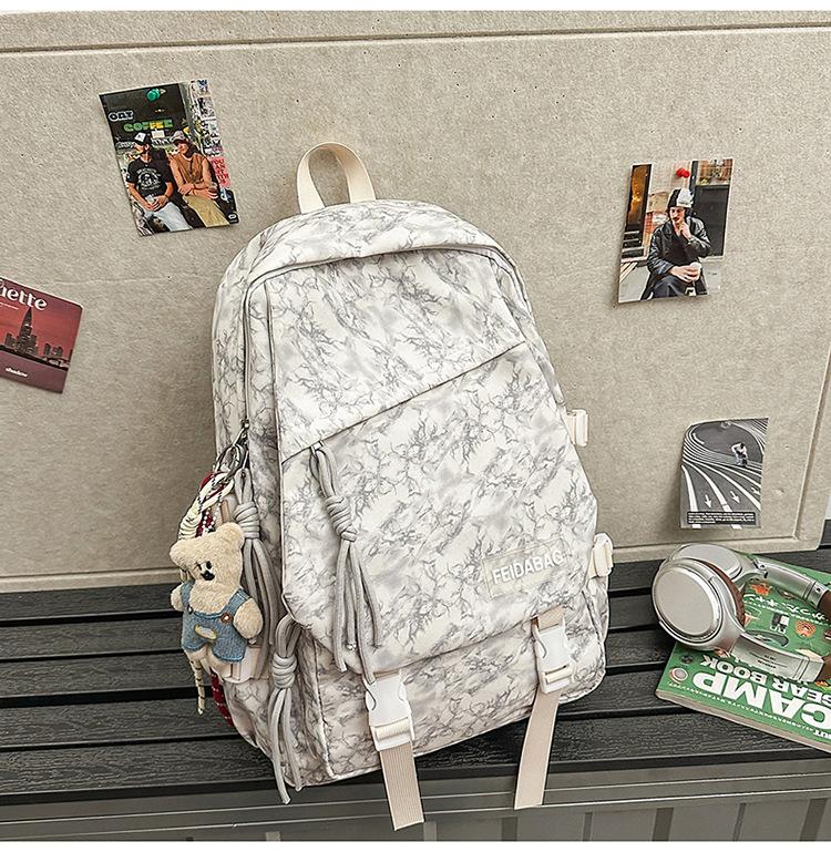 School bag 2025 new backpack light leisure simple outdoor travel backpack junior high school large capacity versatile school bag