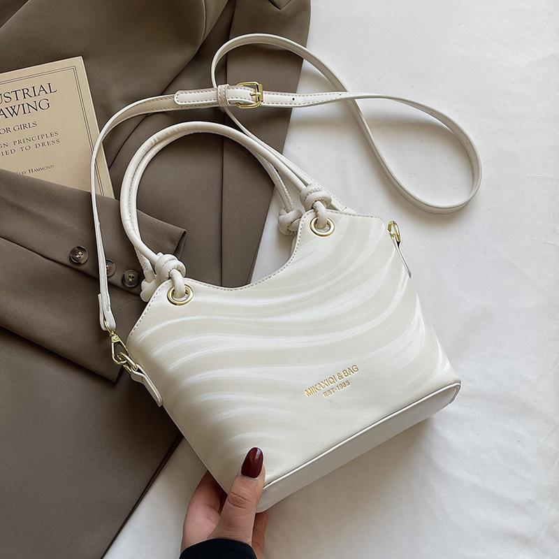 Wholesale New Product Premium Wave Pattern Simple Portable Bucket Bag Women's Leisure Work Commuter Versatile Messenger Bag