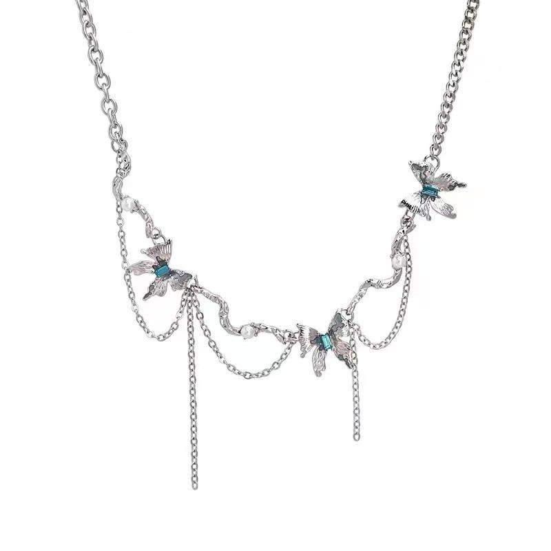 

Lake blue liquid butterfly necklace, light luxury, niche design, high-end design, sweater chain, new women s collarbone chain