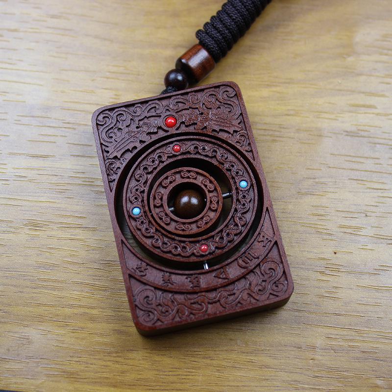 Lucky Jujube Wood Keychain: Double-Sided Exquisite Carving with Rotating Handpiece for Good Fortune.