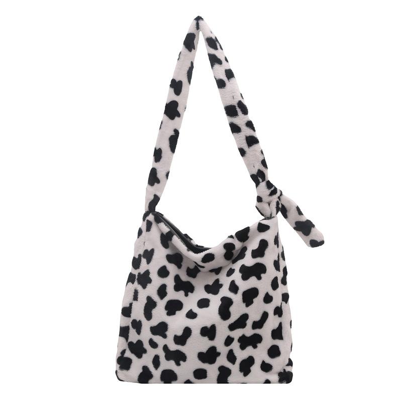 Winter largecapacity plush bag women s new trendy and fashionable versatile plush shoulder bag cow pattern bucket bag