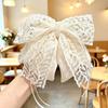 Handgefertigter Chiffon-Haarclip mit floraler Schleife für voluminöses Haar