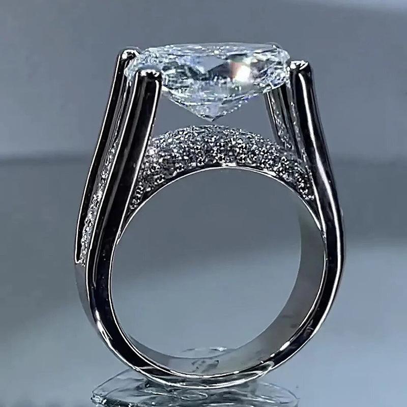 2026 Inlaid Oval Pigeon Egg Cube Zirconia Ring, Fashionable and Personalized Platinum Engagement High-quality Jewelry