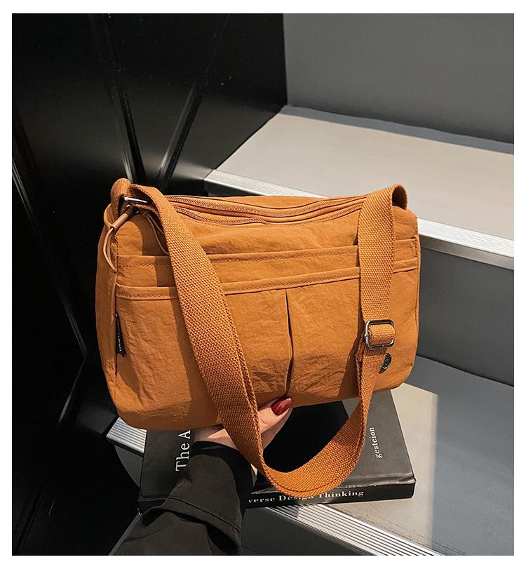 Women's 2025 Sporty Minimalist Crossbody Bag: Lightweight, Large Capacity, Versatile Shoulder Bag for Commute or Casual Use