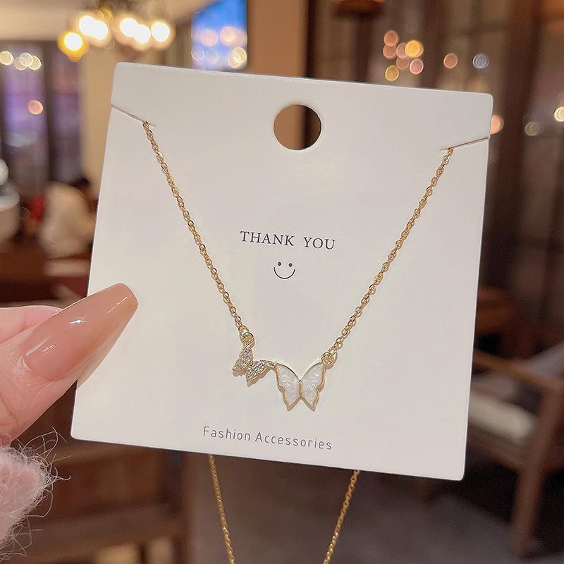 

Корейское асимметричное перламутровое ожерелье-бантик - женское легкое роскошное колье из титановой стали X1024 золотой