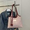 Large capacity tote bag women's new versatile canvas striped commuter shoulder bag women's casual armpit bag