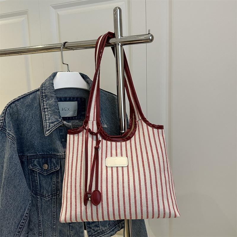 Large capacity tote bag women's new versatile canvas striped commuter shoulder bag women's casual armpit bag