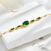Gold Plated Adjustable Bracelet with Oval and Baguette Cut Green Stones Fashion Jewelry for Women