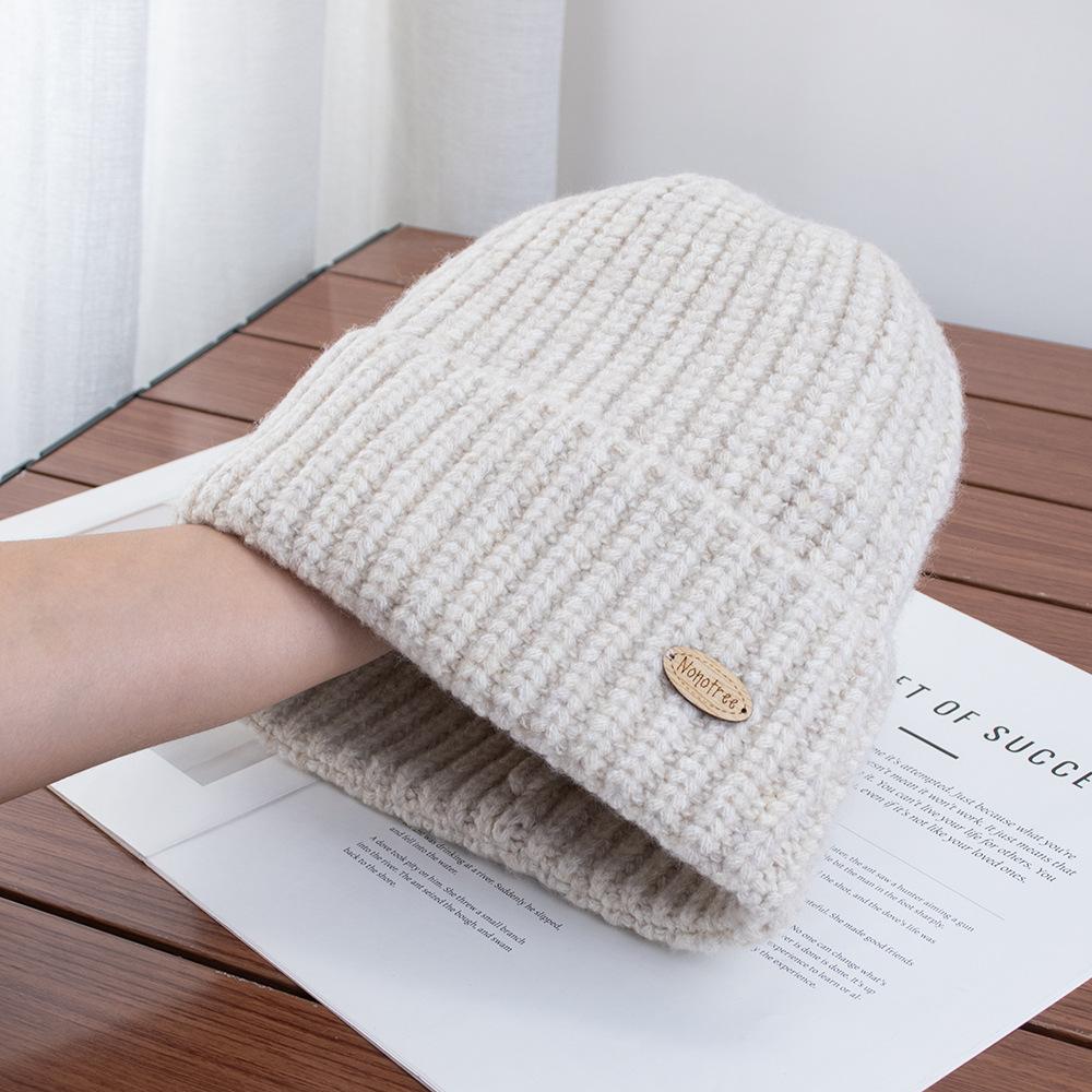 Exquisite small standard simple solid color autumn and winter warm wool knitted hat versatile daily warm face small knitted hat