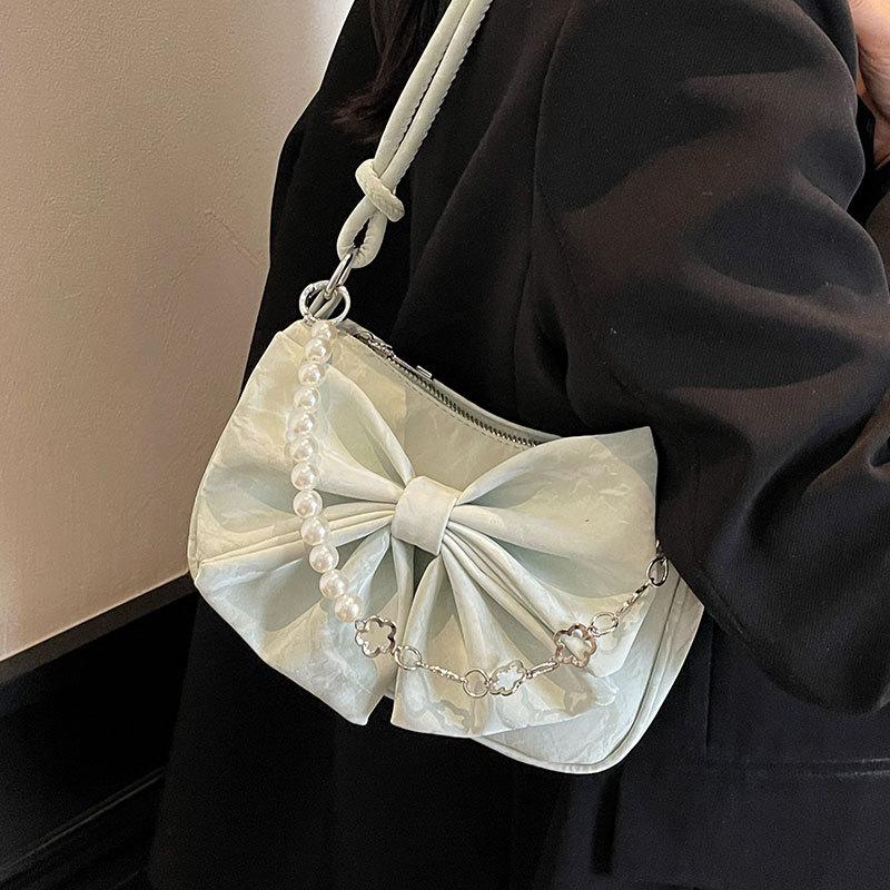 Spring and summer hot sale French niche design bow underarm small bag women's casual high-end texture foreign-style messenger bag
