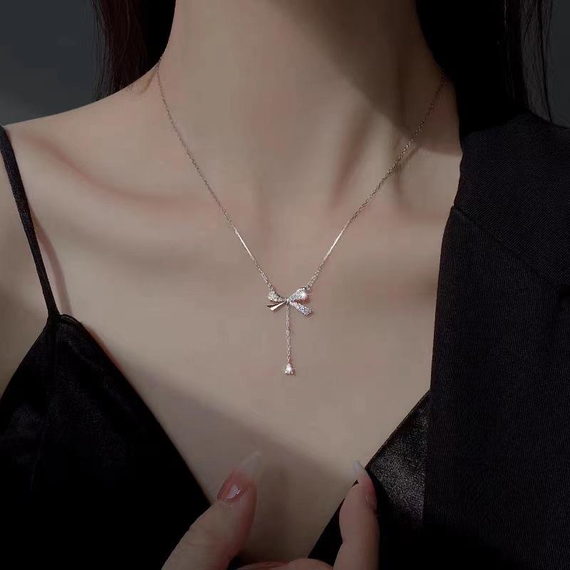 Titanium Steel Necklace: Non-Fading, Flashing Bow, Versatile Tassel Clavicle Chain for a Light Luxury Look