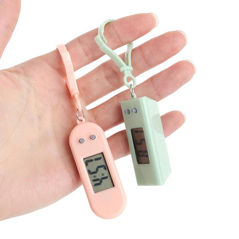 Přenosný elektronický klíčenka hodinky Mini kapesní elektronické oválné závěsné hodinky Digitální stolní čas datum displej hodiny pro studenta