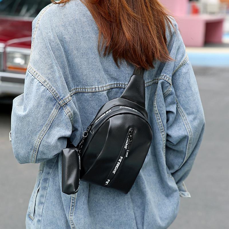 New fashion breast bag, shoulder messenger bag, sports bag with pendant, change bag, letter bag, one piece.