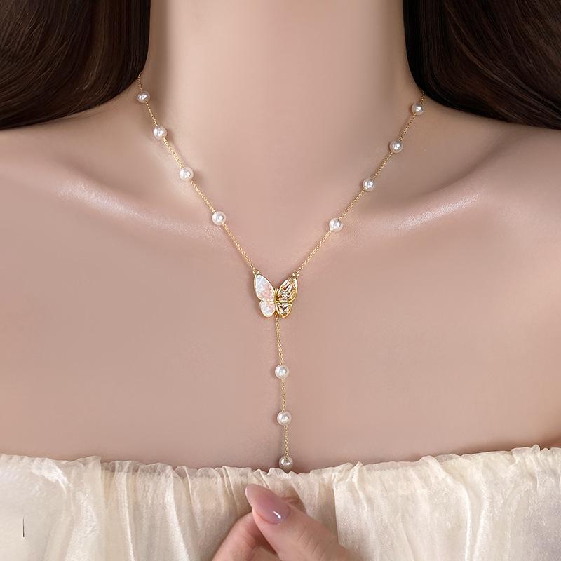 Schmetterlingsquaste Perlenanhänger Halskette: Elegante High-End Schlüsselbeinkette für Damen