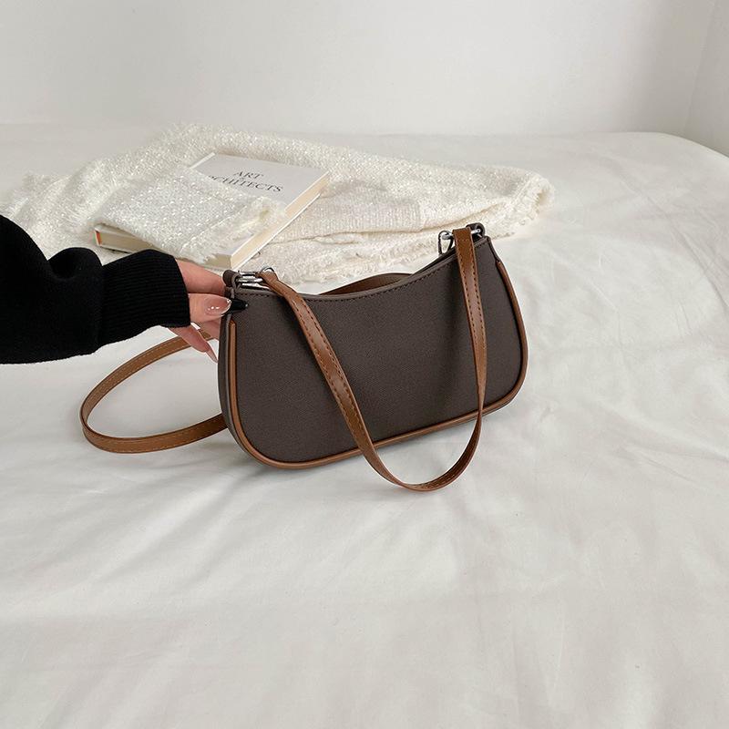 

Trendy retro underarm bag women s autumn and winter new high-end simple crescent versatile shoulder messenger bag tide темно-коричневого кольору