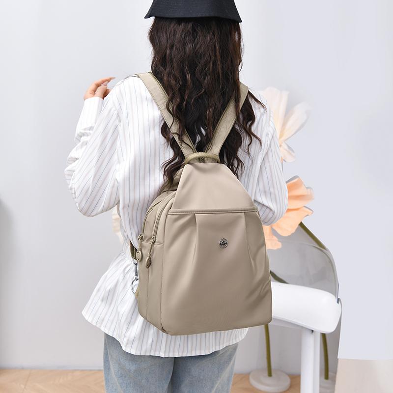 Compact Backpack with Adjustable Straps and Front Zipper Pocket