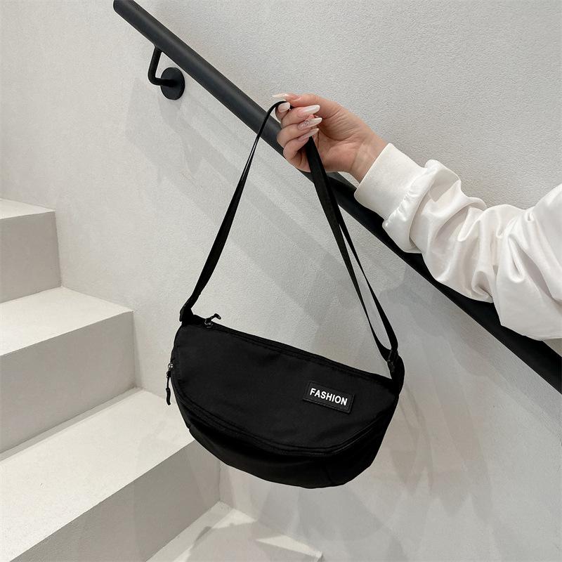 New casual messenger bag men and women versatile commuting class large capacity student mailman couple outdoor sports bag