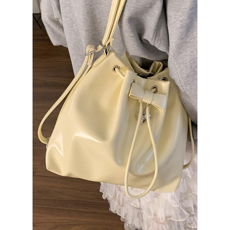 Korean version of large-capacity bucket bag 2025 new solid color niche simple casual shoulder bag multi-functional backpack