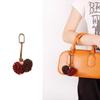 Portachiavi e Ciondolo per Borsa con Nappa a Forma di Palla di Bacca di Bayberry in Stile Zhang Yuanying