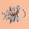 Fashionable goldfish pendant keychain, simple and elegant souvenir gift for travelers, perfect for fishing enthusiasm.
