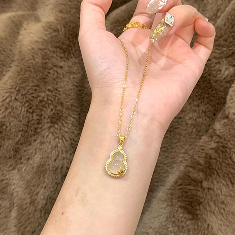 Jade Leaf Gourd Necklace - Elegant Gold Branch Design for Women, Versatile Clavicle Chain, Light Luxury Pendant