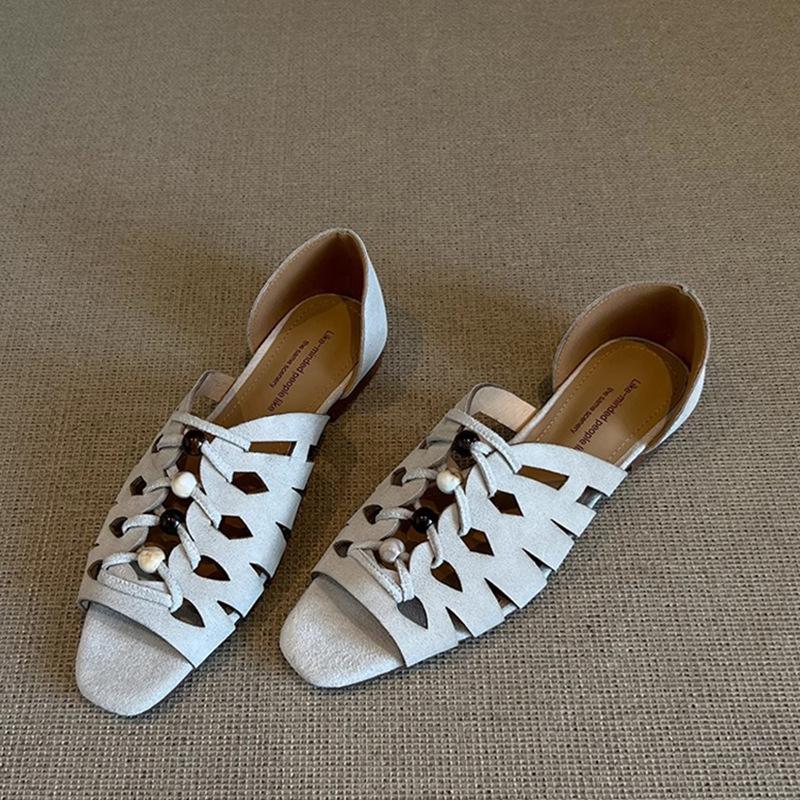 Hair~ Niche design sense woven hollow sandals women's summer wear commuting simple and versatile shoes