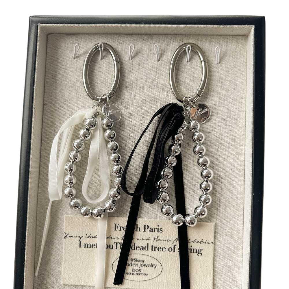 Korean-Style Bow Car Keychain with High-End Silver Bead Ribbon Pendant