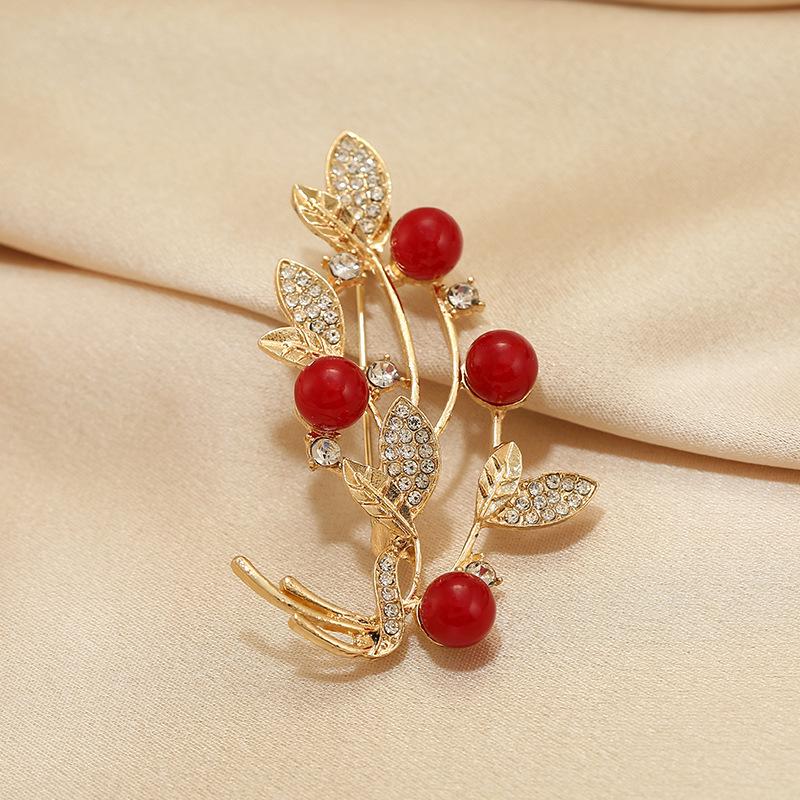 Elegante Schmetterlingsbrosche mit Perle – Damen-Modeschmuck-Anstecknadel von hoher Qualität