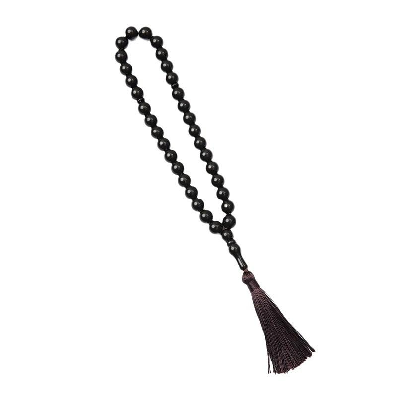 Handgefertigtes grenzüberschreitendes 33-Perlen-Quastenarmband - Gebetsperlen aus Korallimitat