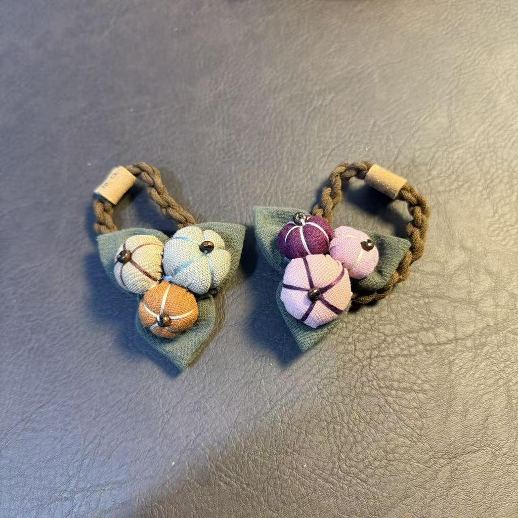 Retro Forest-Style Fabric Hair Tie/Scrunchie: Versatile and Artistic Pumpkin Design for Women.