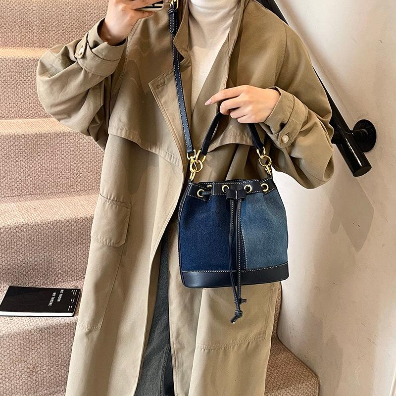 Winter new fashion niche popular contrasting colors pump belt bucket bag versatile portable shoulder women's bag