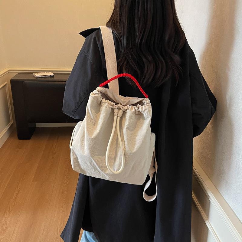 New bundle bag Korean version texture bucket bag women's fashion trendy cool backpack casual texture women's backpack